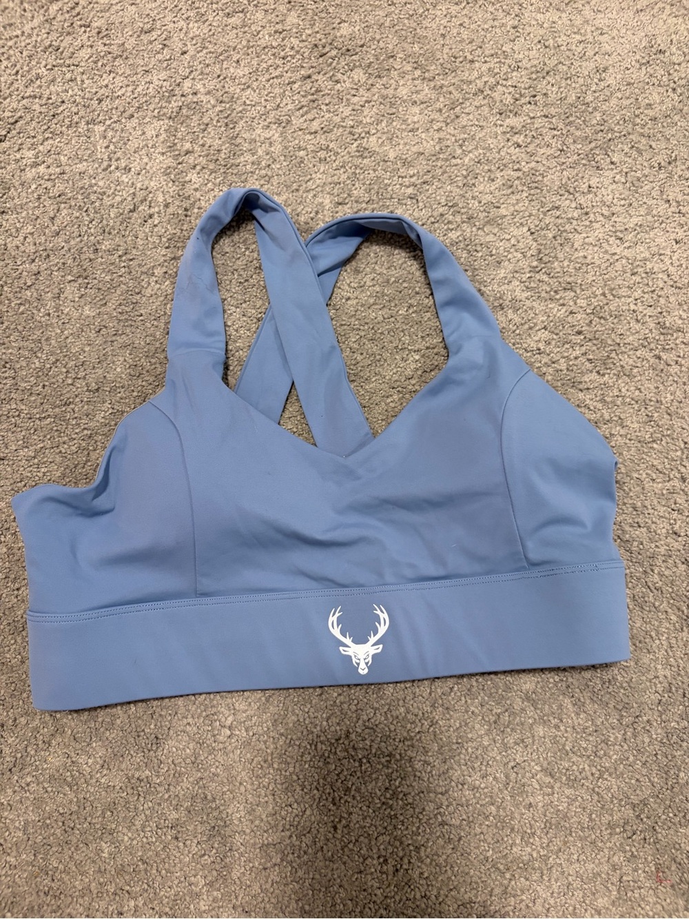 Crisscross Light Blue Sports Bra with Deer Emblem